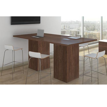 brown rectangle conference table surrounded by white chairs